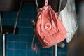 Two tone backpack against a plain background