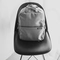 Backpack resting on a chair