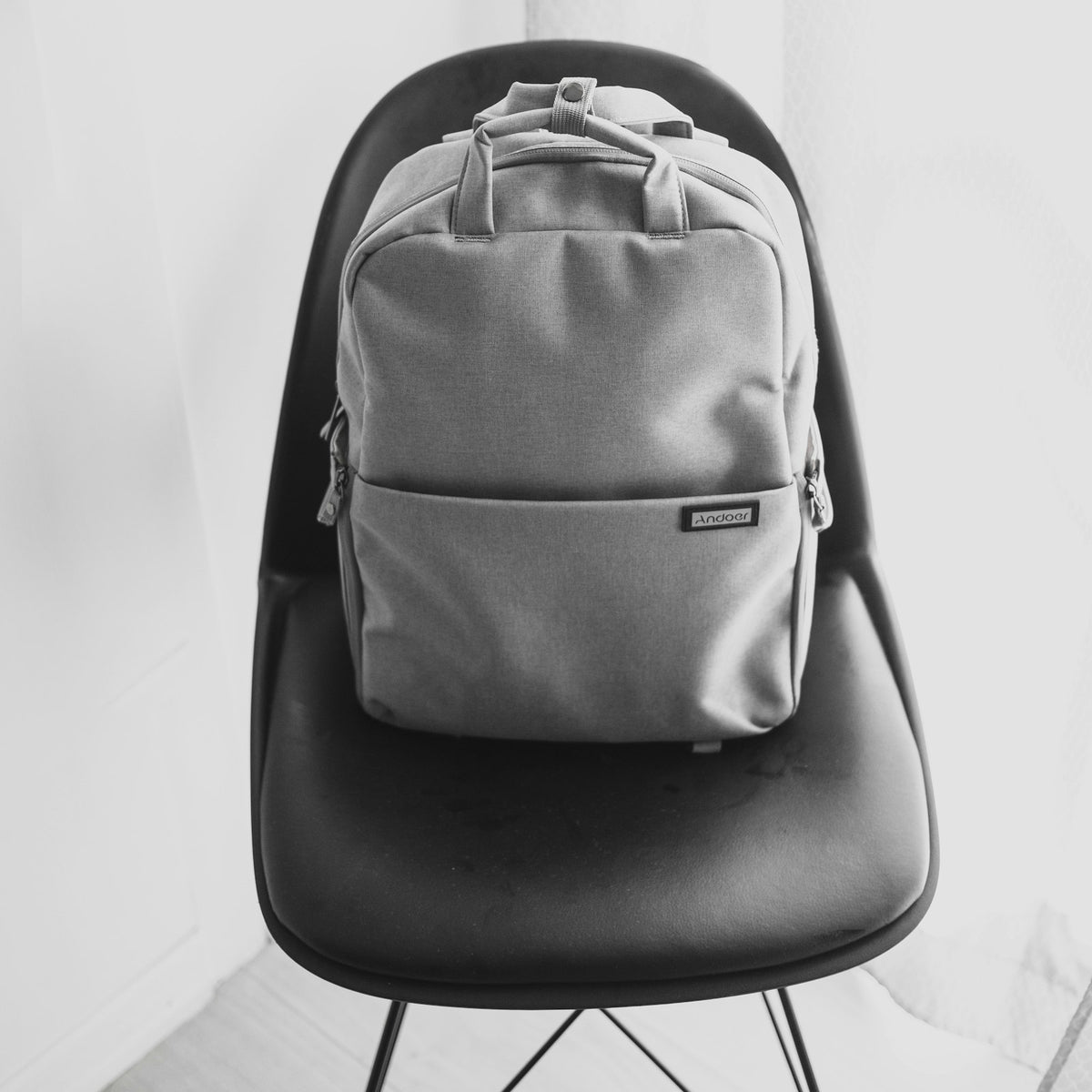 Backpack resting on a chair