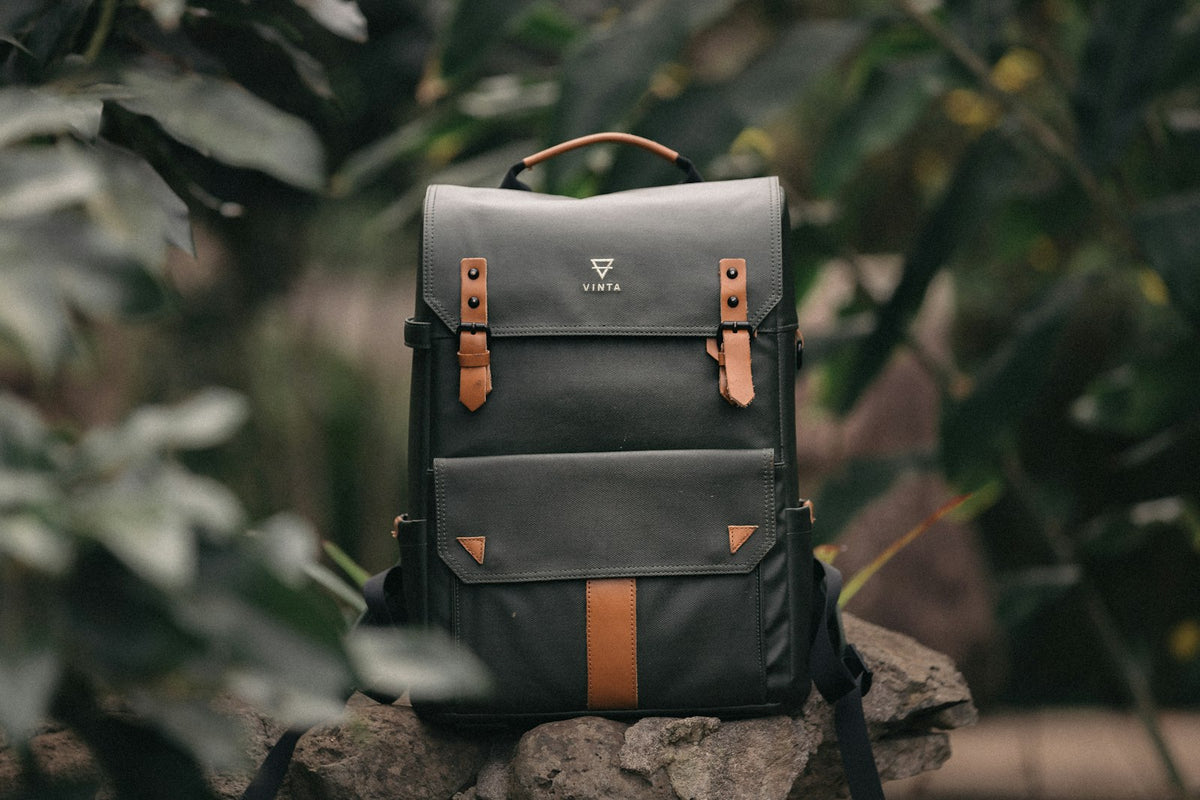 Leather trimmed backpack on a rock