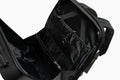 Black backpack with a padded shoulder strap