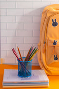 Yellow backpack sitting on a table